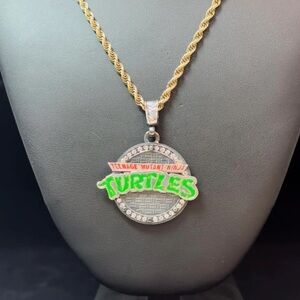 Iceman's TMNT NYC rotating sewer cap 14k Gold